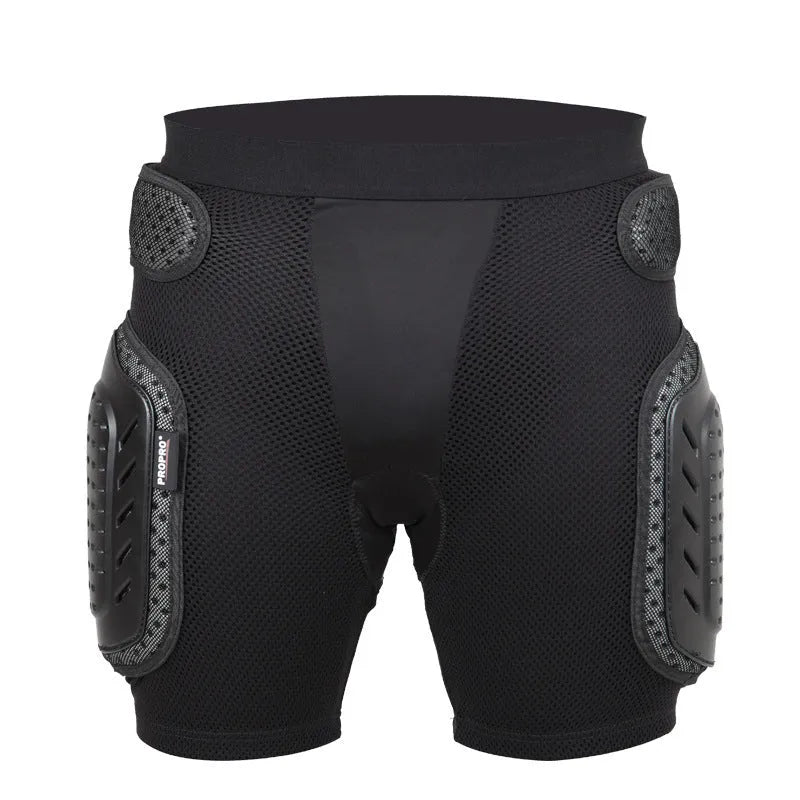 Black cycling hip protection pants showing integrated hip pad, displayed flat.