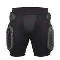 Black cycling hip protection pants showing integrated hip pad, displayed flat.