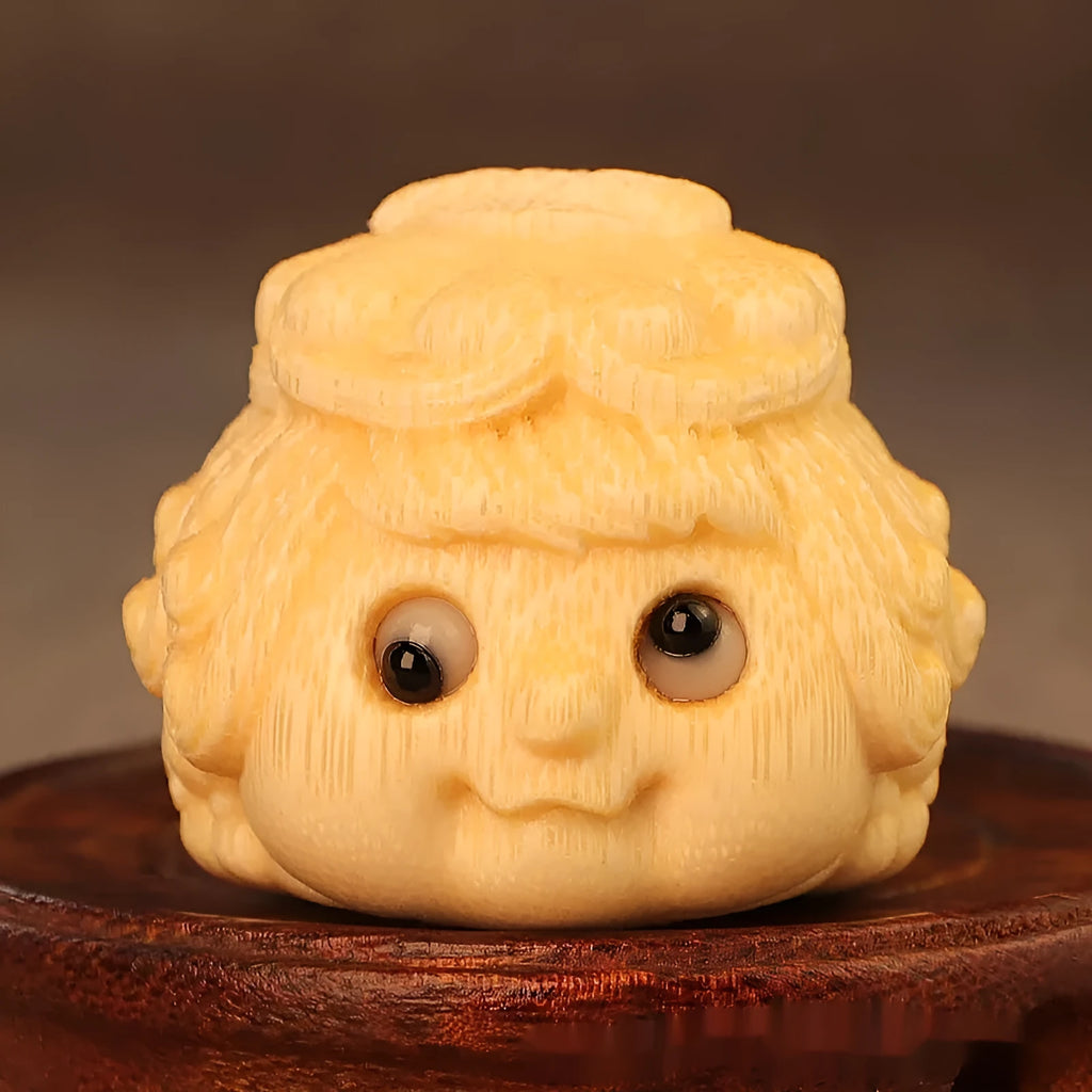 Solid bamboo carving of a cute golden toad Princess ornament for home display.