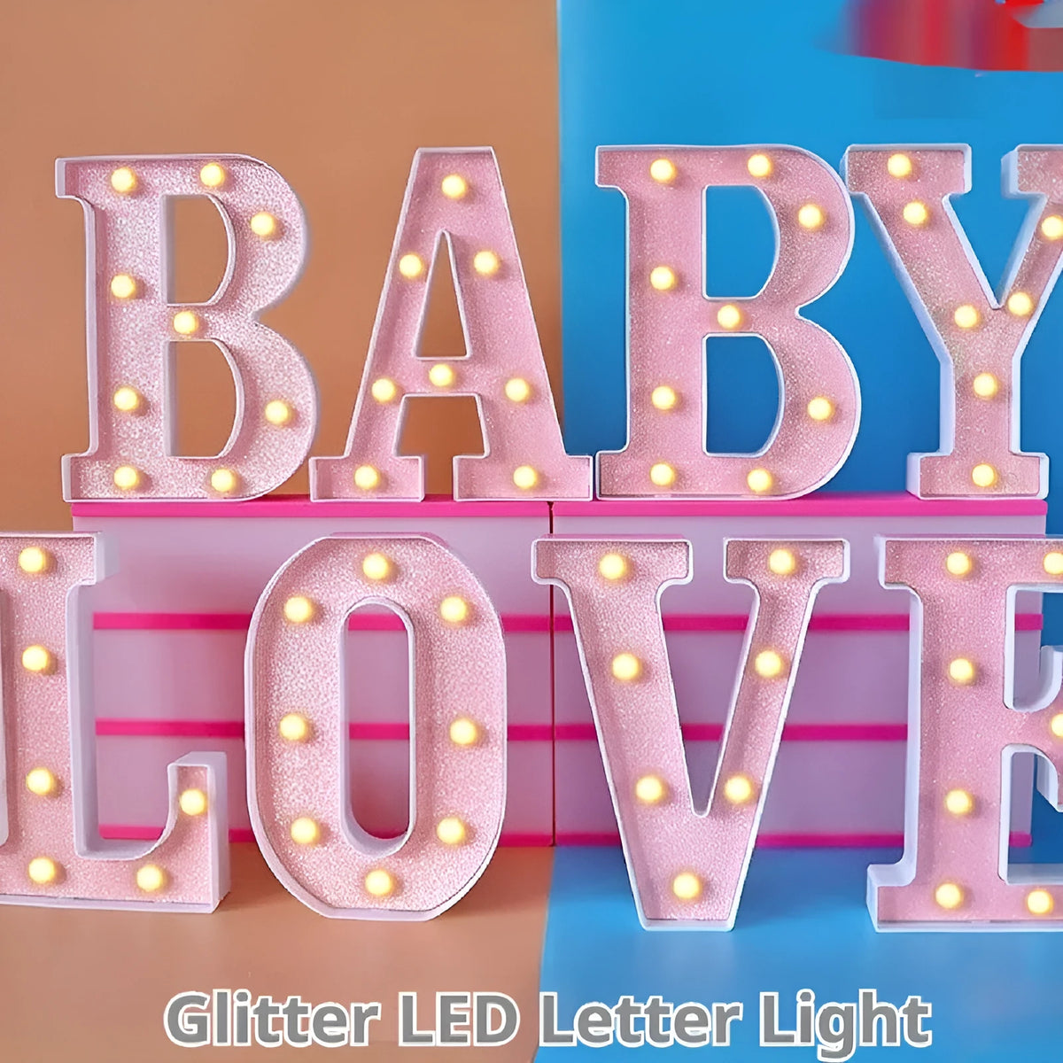 22cm LED letter light in plastic, battery operated, IP44 rated, shown as a letter for birthday party scene decoration