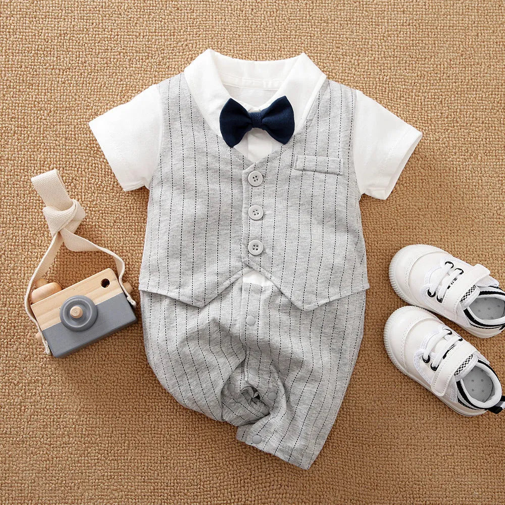 Baby boy in a wine red gentleman-style long-sleeved cotton jumpsuit.