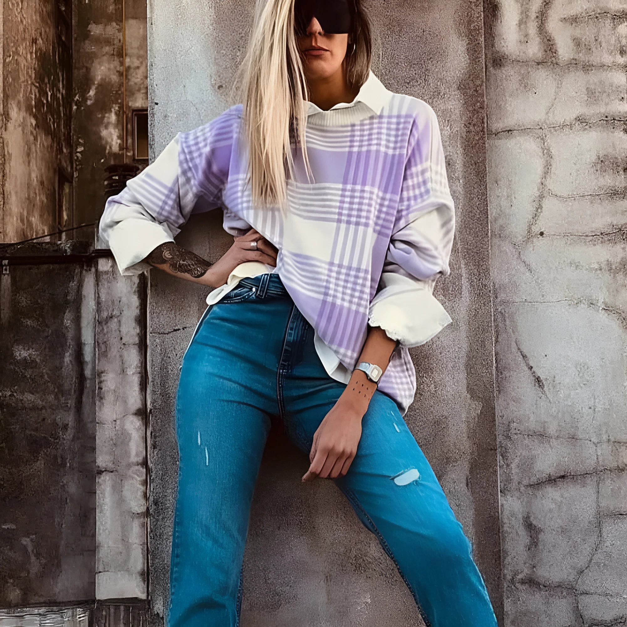 Lilac plaid print loose-fitting women's sweater with long sleeves and ribbed trim.