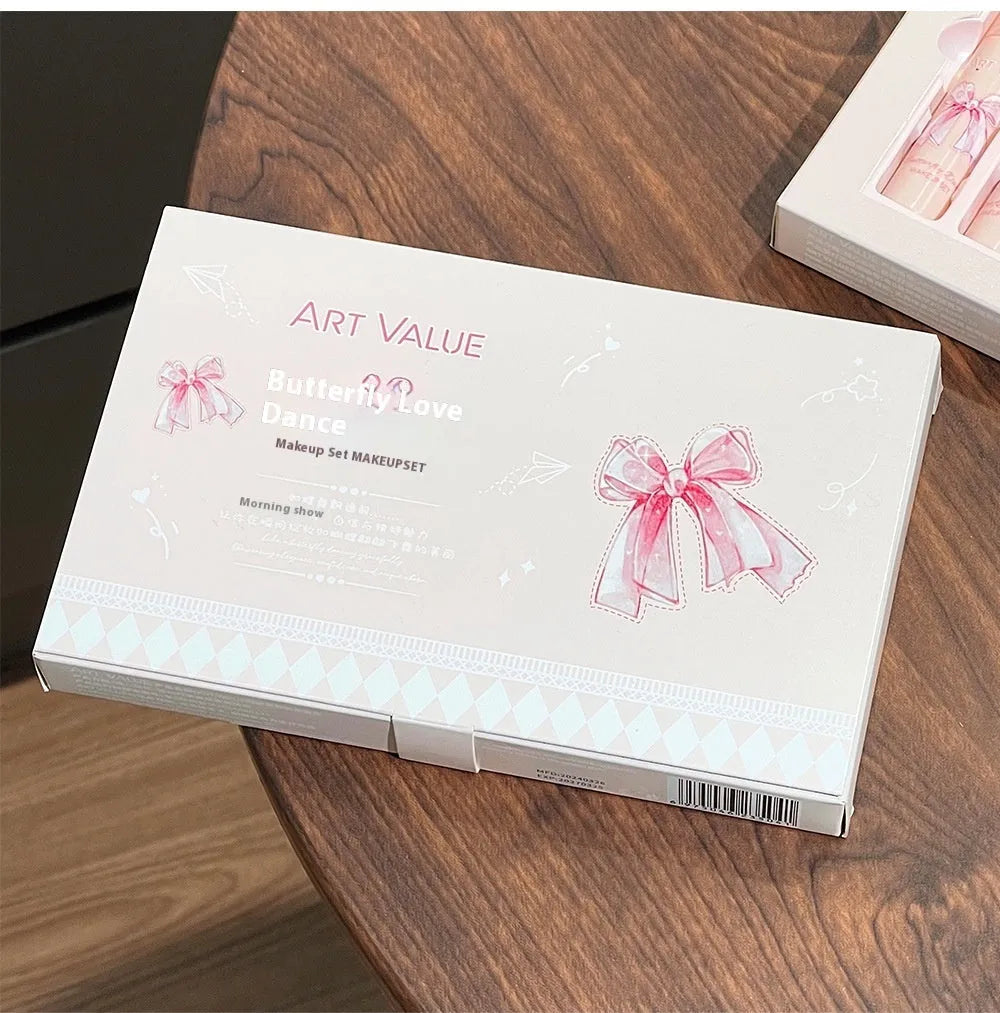 Butterfly Box makeup set showing pink lip muds, blush and butterfly necklace