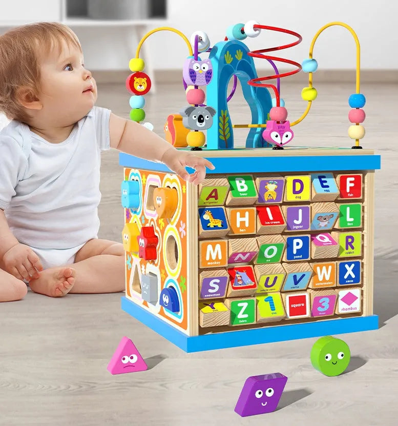 Blue wooden bead maze activity cube with multiple play scenes for toddlers