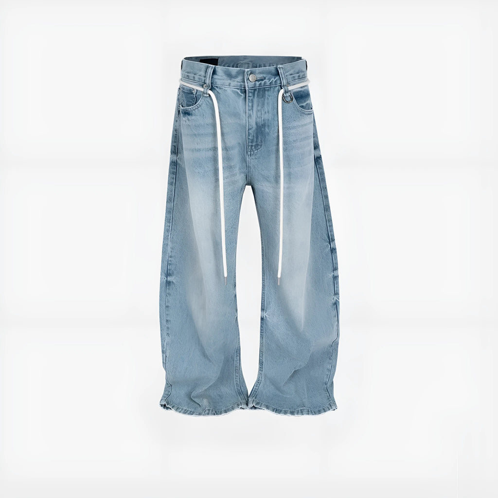 Blue vintage washed straight-leg denim trousers with drawstring belt laid flat