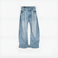 Blue vintage washed straight-leg denim trousers with drawstring belt laid flat