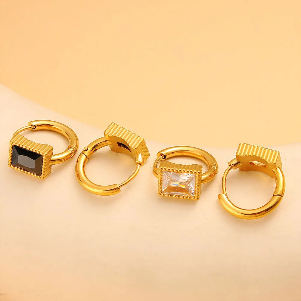 Square zircon stainless steel earrings in geometry design with round ring details, shown in white colour.