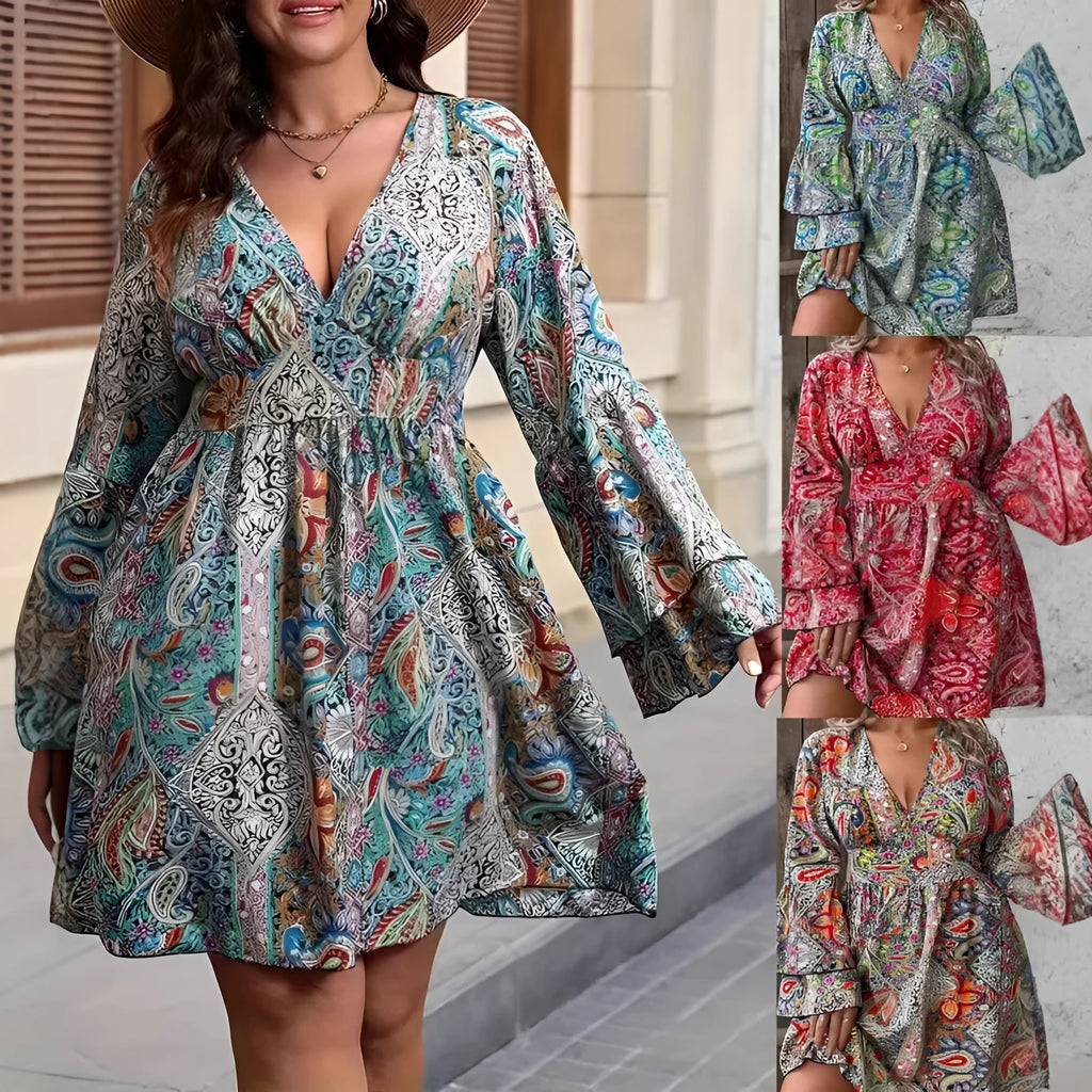 Plus size woman in a printed V-neck dress with long bell sleeves and an A-line skirt.