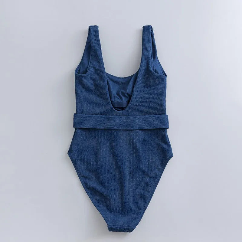 Navy blue women's one-piece triangle swimsuit with chest pads and sleeveless design