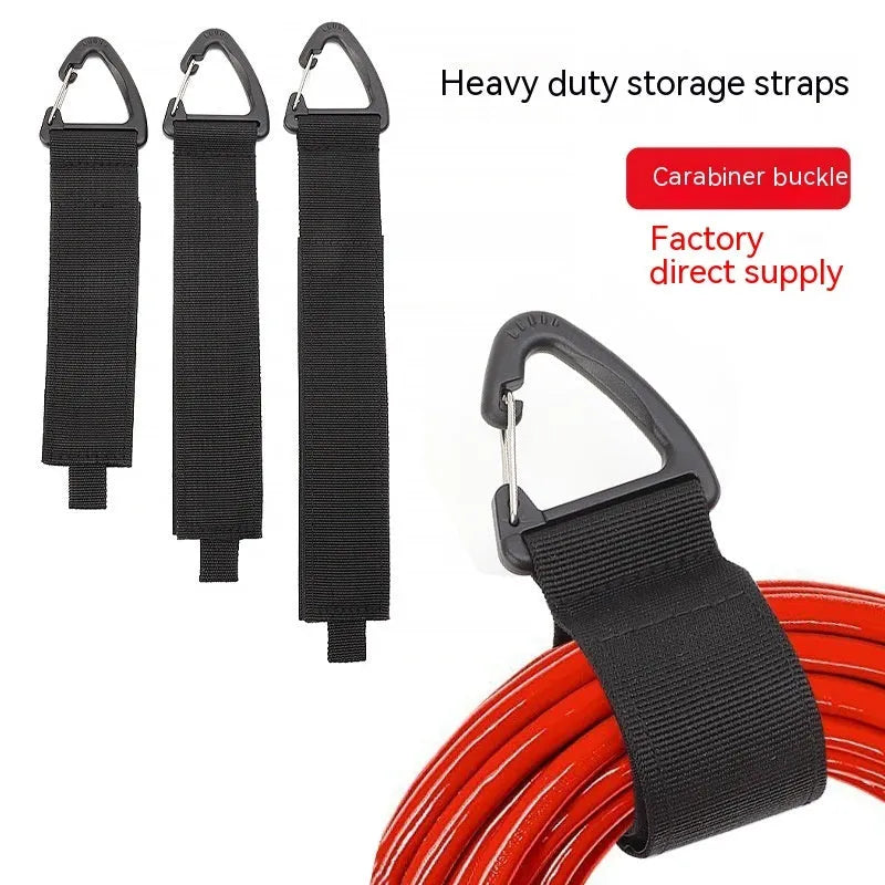 Black heavy-duty storage strap with carabiner hook and gravity strap climbing button for tool organisation