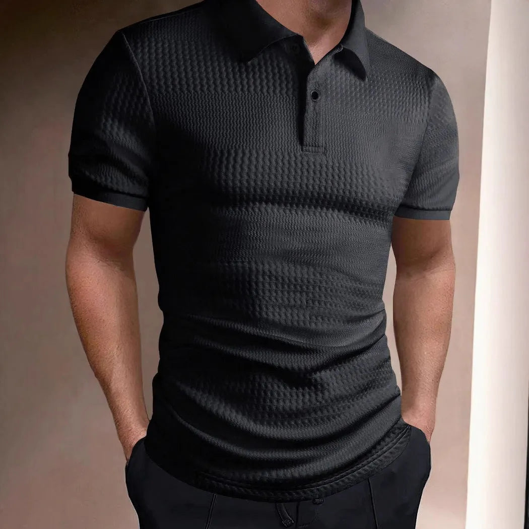 Men's striped polo shirt in loose fit with short sleeves showing asymmetric design detail