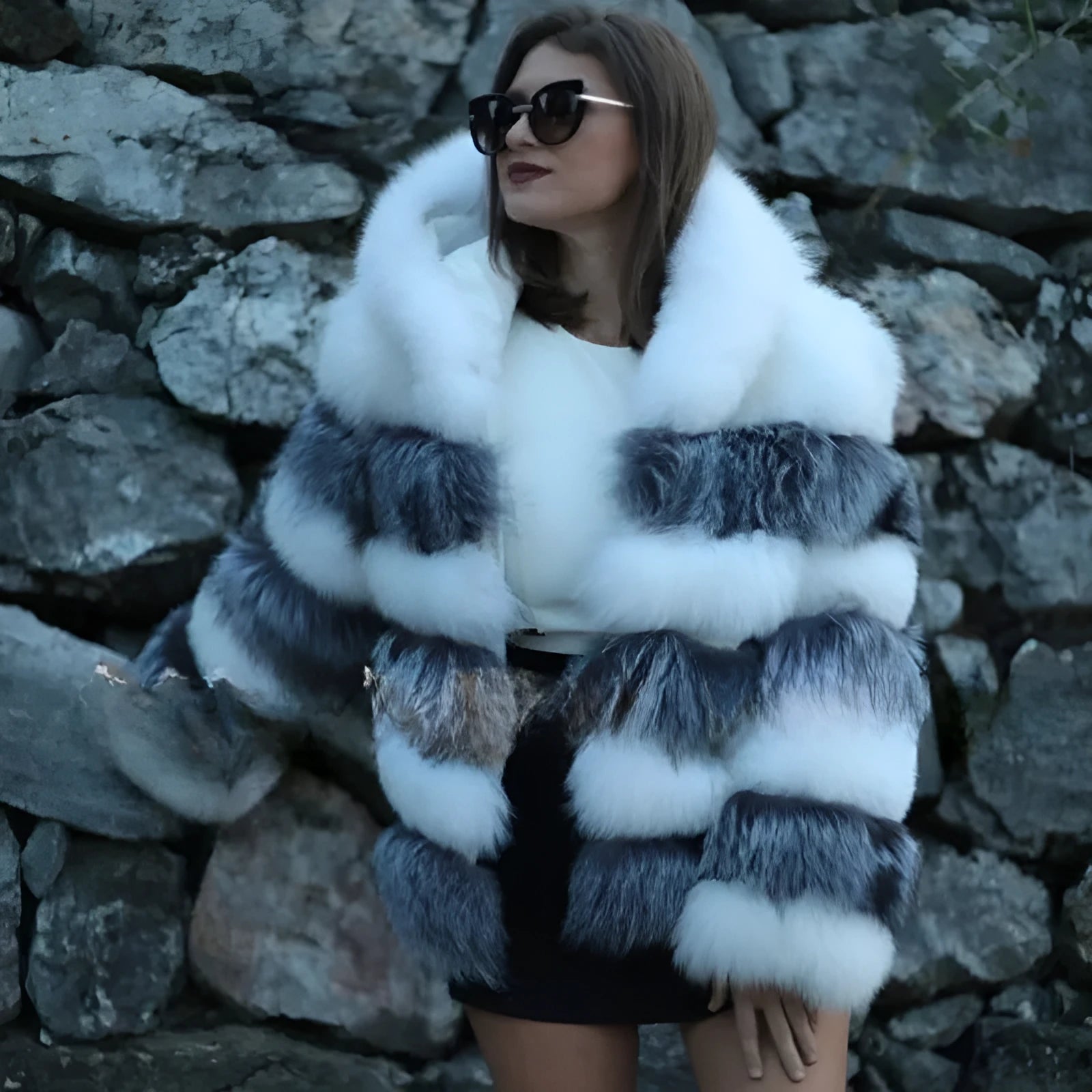 Women's brown artificial fur hooded coat on a hanger, street fashion style.