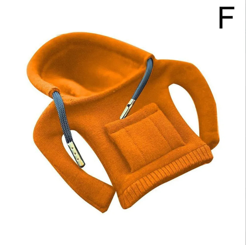 Cloth car gear shift knob hoodie cover in multiple colour options next to a gear lever.