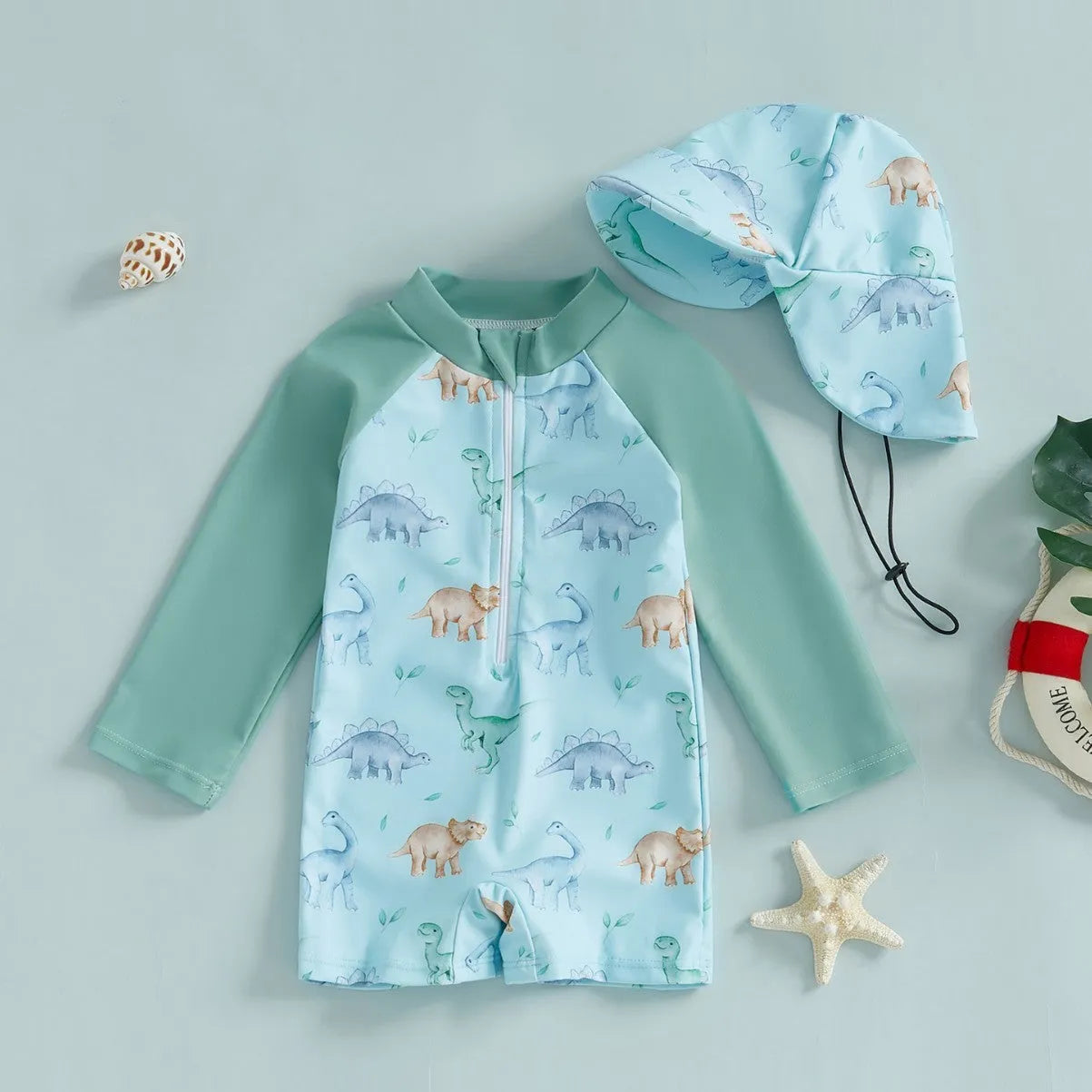 Baby wearing a dinosaur light green sleeve one-piece long sleeve swimsuit
