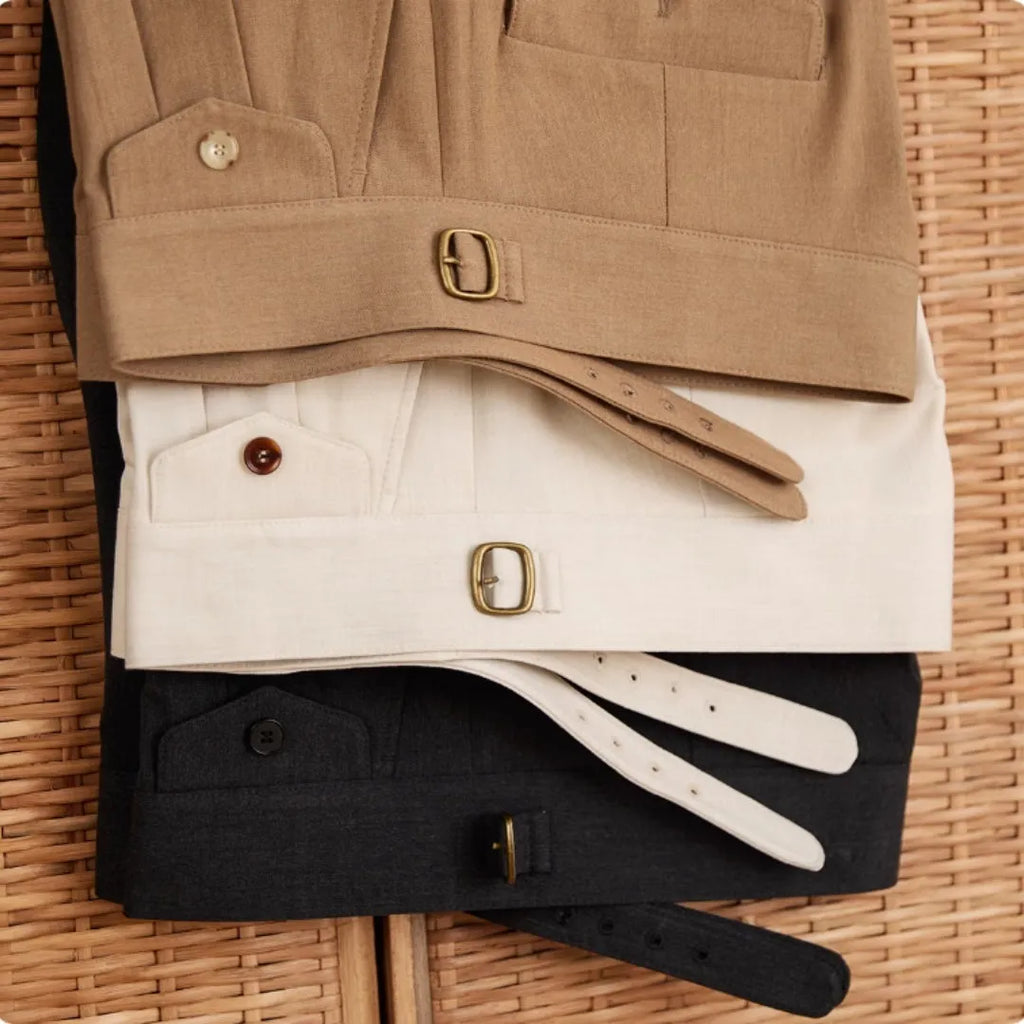 Men's slim fit straight leg trousers in dark grey, light brown, and light apricot colours.