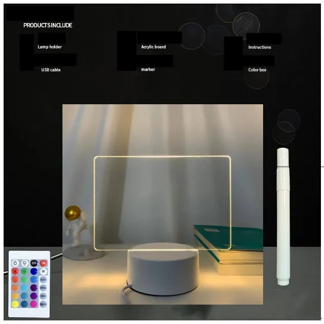 3D acrylic message board night light with remote control and stylus on a desk.