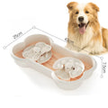 Large green slow feeder dog bowl with three rotating puzzle trays and anti-slip suction cups