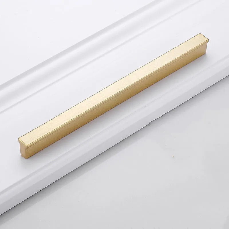 Gold coloured aluminium T-shape single hole cabinet handle and drawer pull