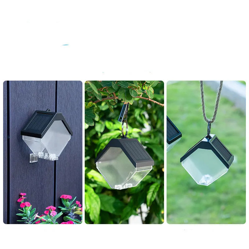 Outdoor solar ice brick chandelier with dual colour LED warm and colour light hanging in a garden