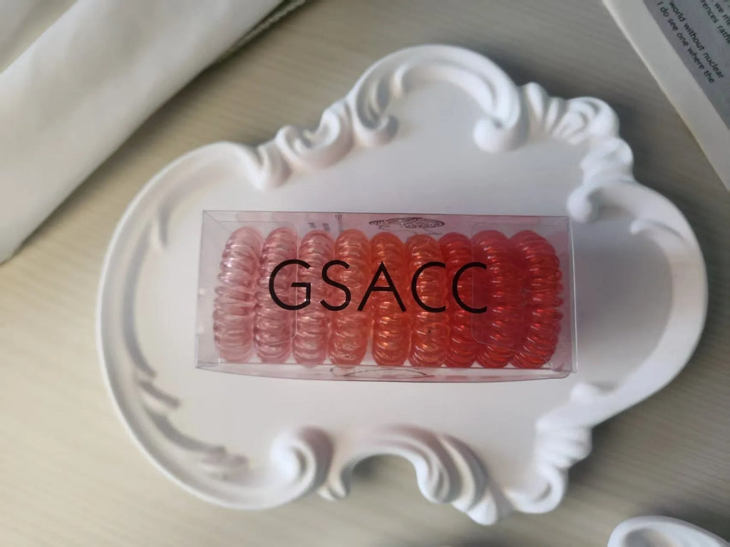 Traceless TPU hair rings in assorted colours on white background