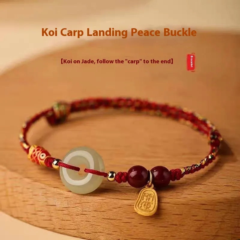 Handmade bracelet with Hetian jade peace buckle charm on adjustable braided rope.