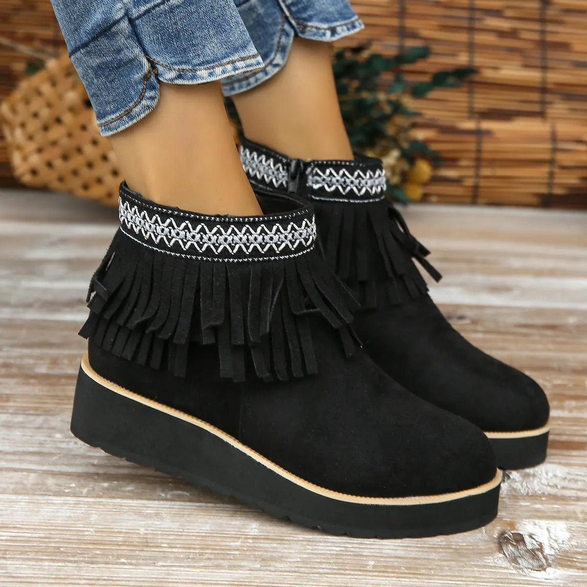 Women's suede wedge ankle boot with thick rubber sole and side zip in black, blue, or dark brown