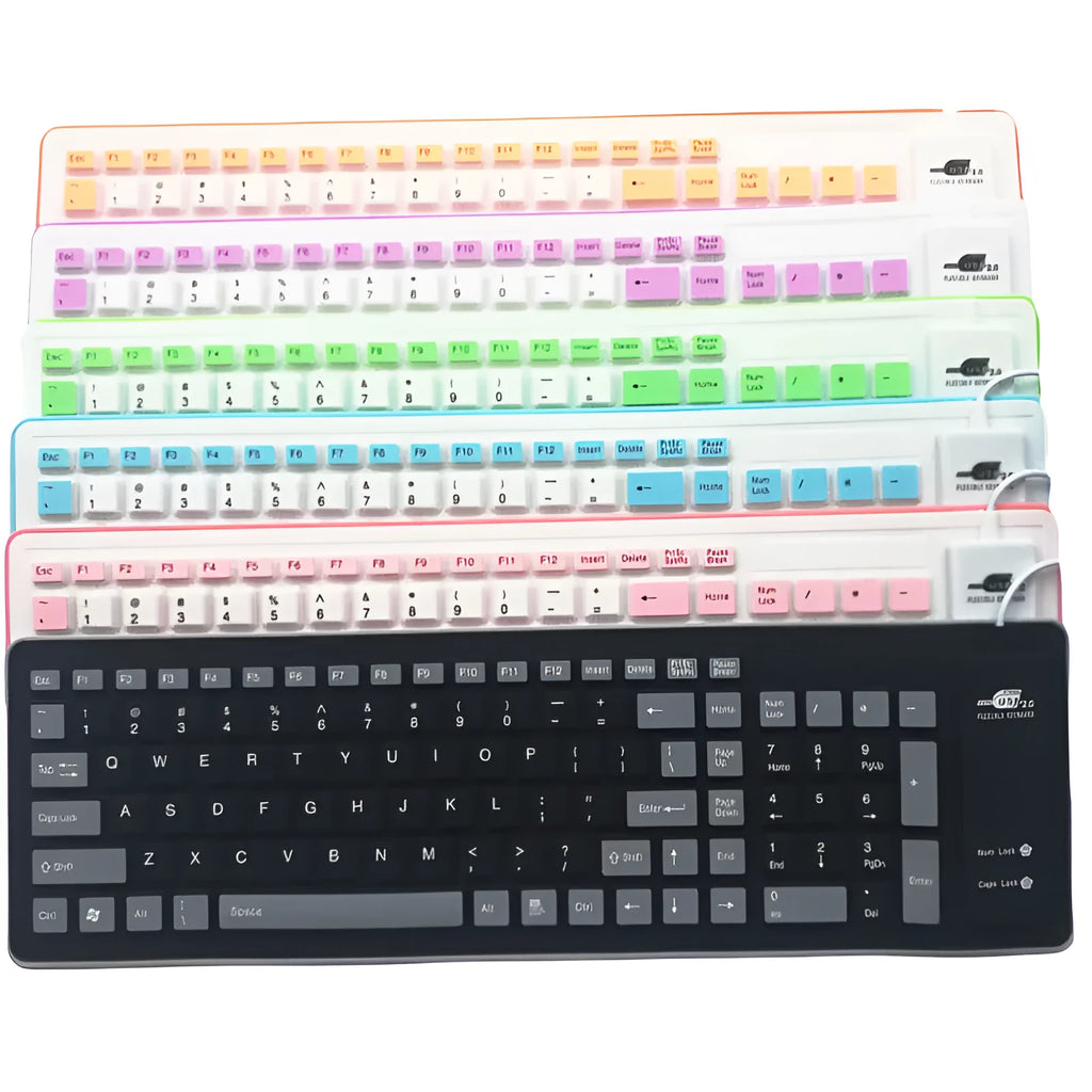 Folding waterproof silicone keyboard in pink with USB cable on a desk