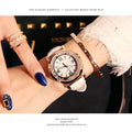 Rhinestone women's quartz watch with round 3.8cm dial, metal case, PU strap, and pin buckle.
