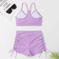 Women's high waisted split bikini swimsuit in black or violet colours