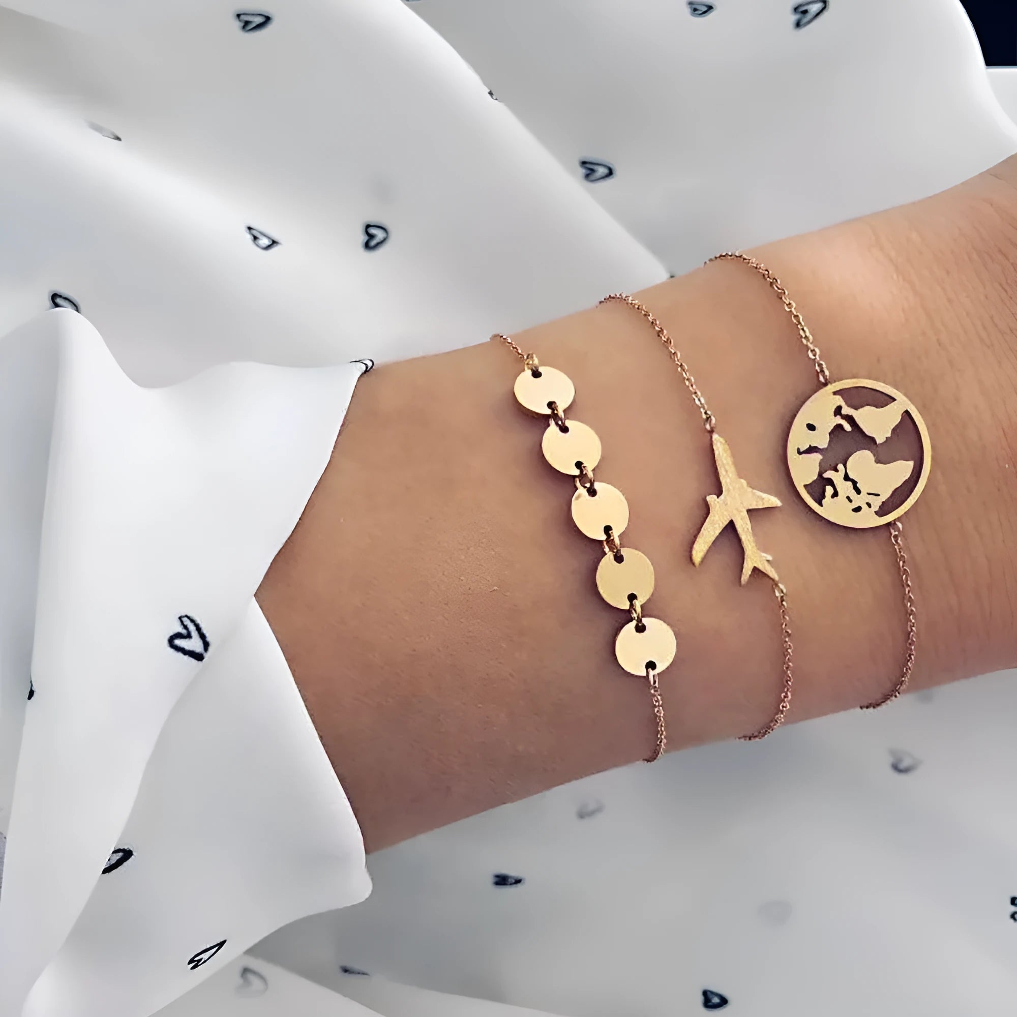 Set of three bohemian-style women's bracelets with aircraft map designs on heart-shaped alloy charms