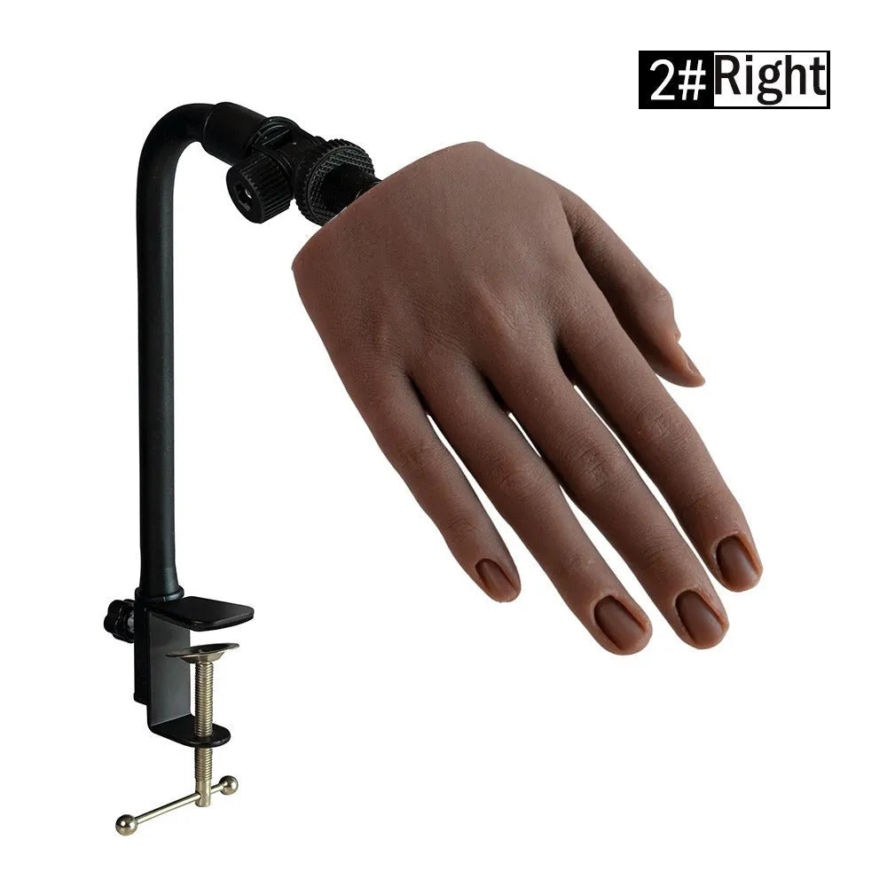 Realistic silicone nail art practice hand model with flexible fingers on a table
