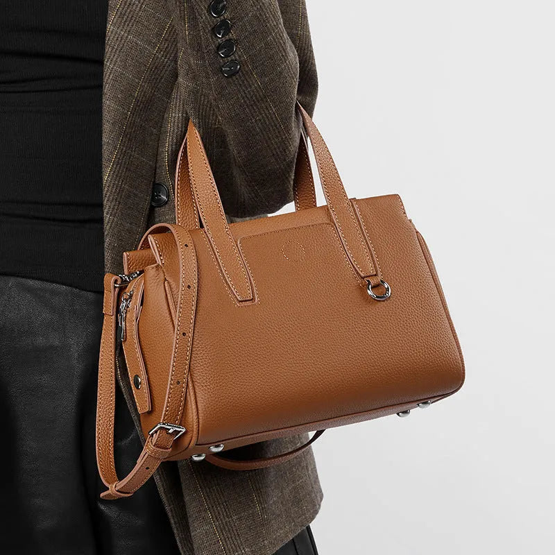 Genuine cowhide leather crossbody bag in horizontal square design with adjustable shoulder strap