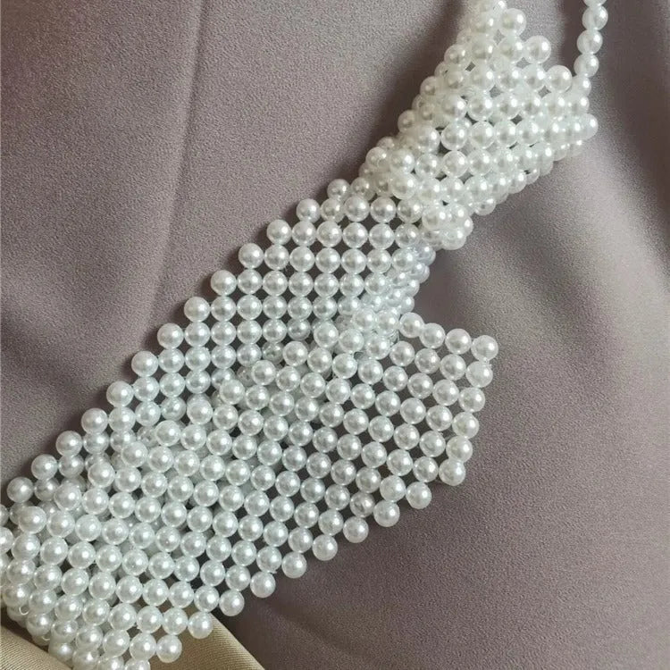 Women's pearl tie body chain jewellery with hollow-out design and alloy fastening
