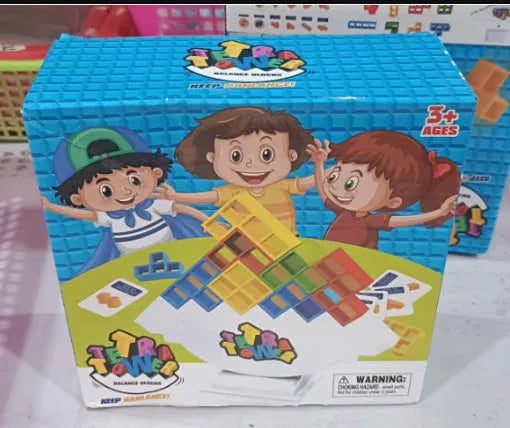 Plastic balance stacking game with colourful blocks on a chassis