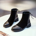 Black women's above-the-knee Martin boots with a side zipper, round toe, and decorative bow.