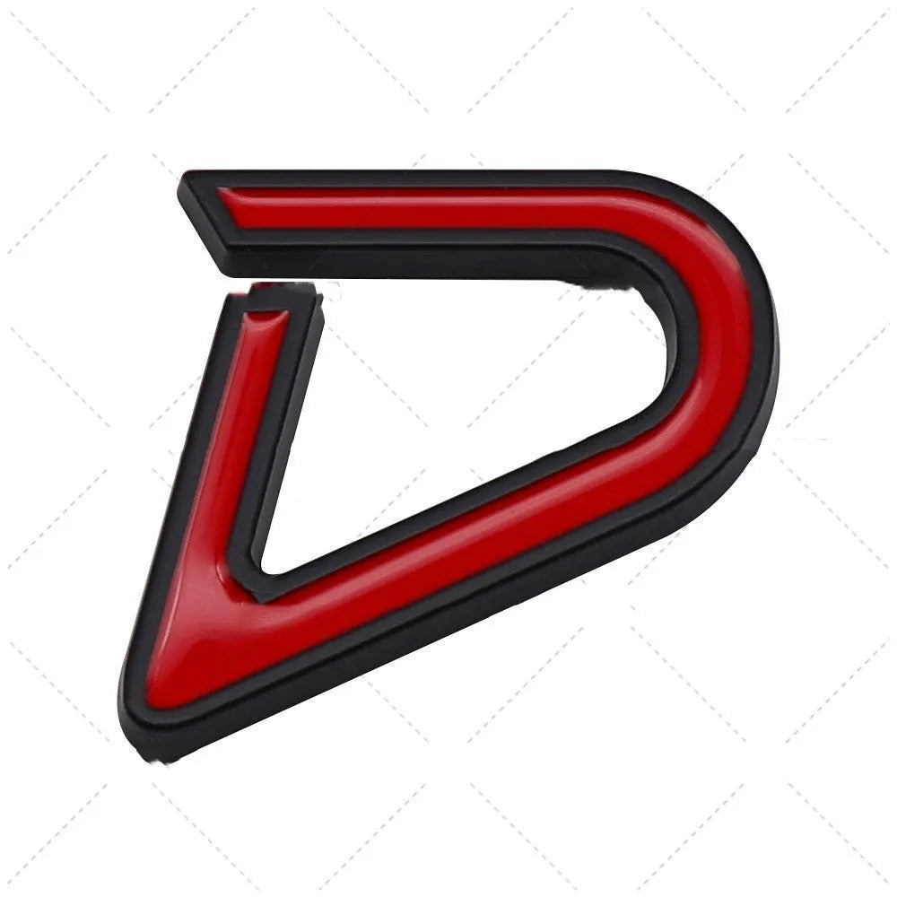 Red and silver SD design metal bumper sticker next to smaller red and black D design, showing scale.