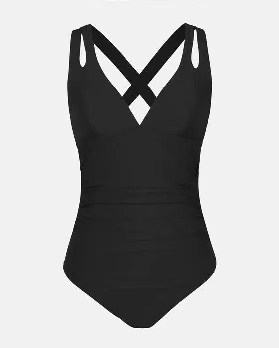 Solid colour one-piece swimsuit with cross shoulder straps showing triangle design and nylon lining details