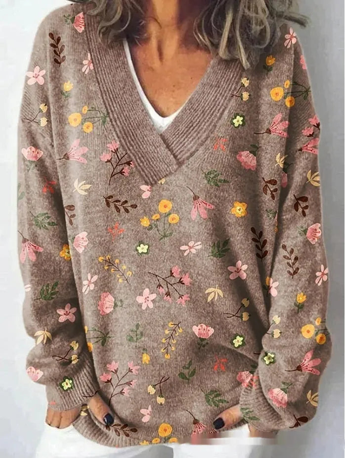 Women's V-neck long sleeve sweatshirt with a 3D floral print pattern.
