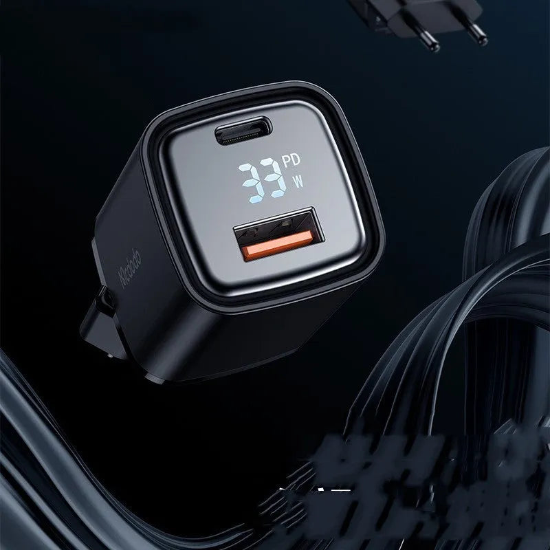 Dual-port digital display fast charging charger in black with USB-A and USB-C ports, 81x33x28mm