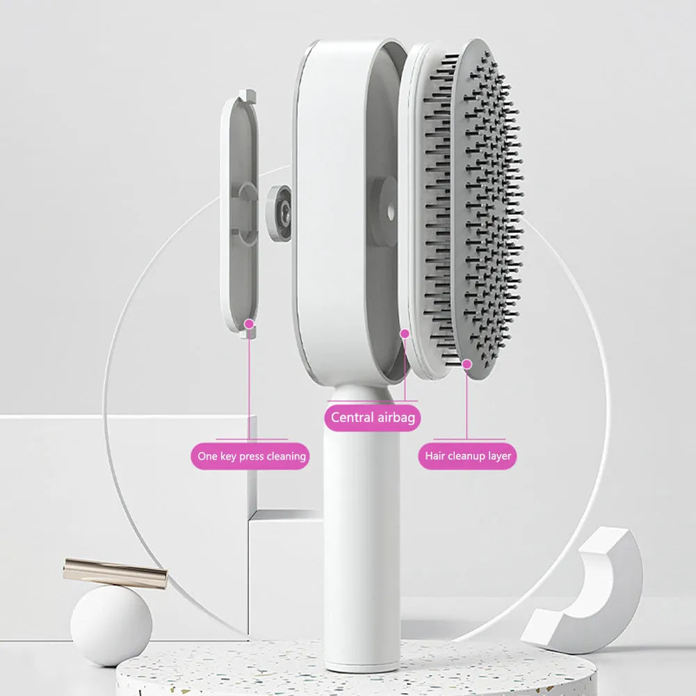 Self-cleaning air cushion hair brush in white, black gold, or black purple with ergonomic handle