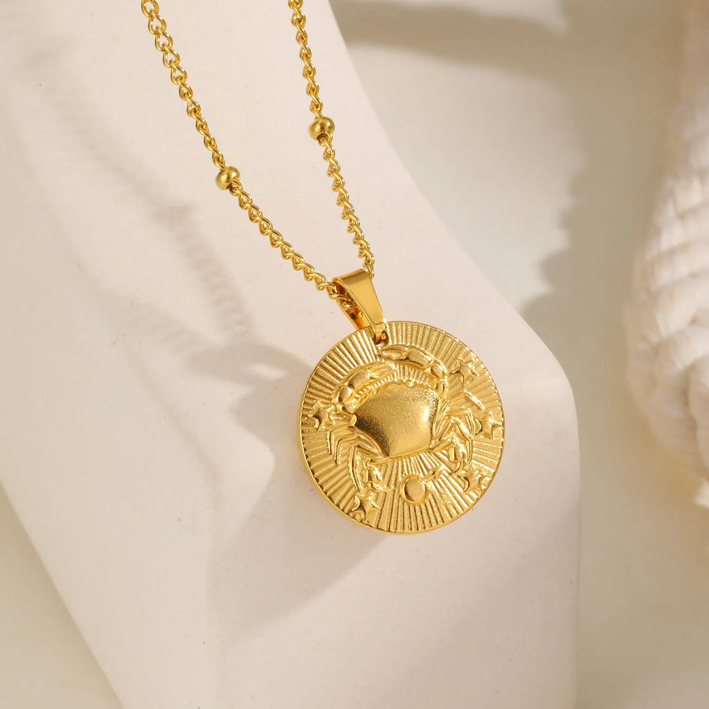 Stainless steel zodiac constellation necklace with twelve charm pendants on cross chain
