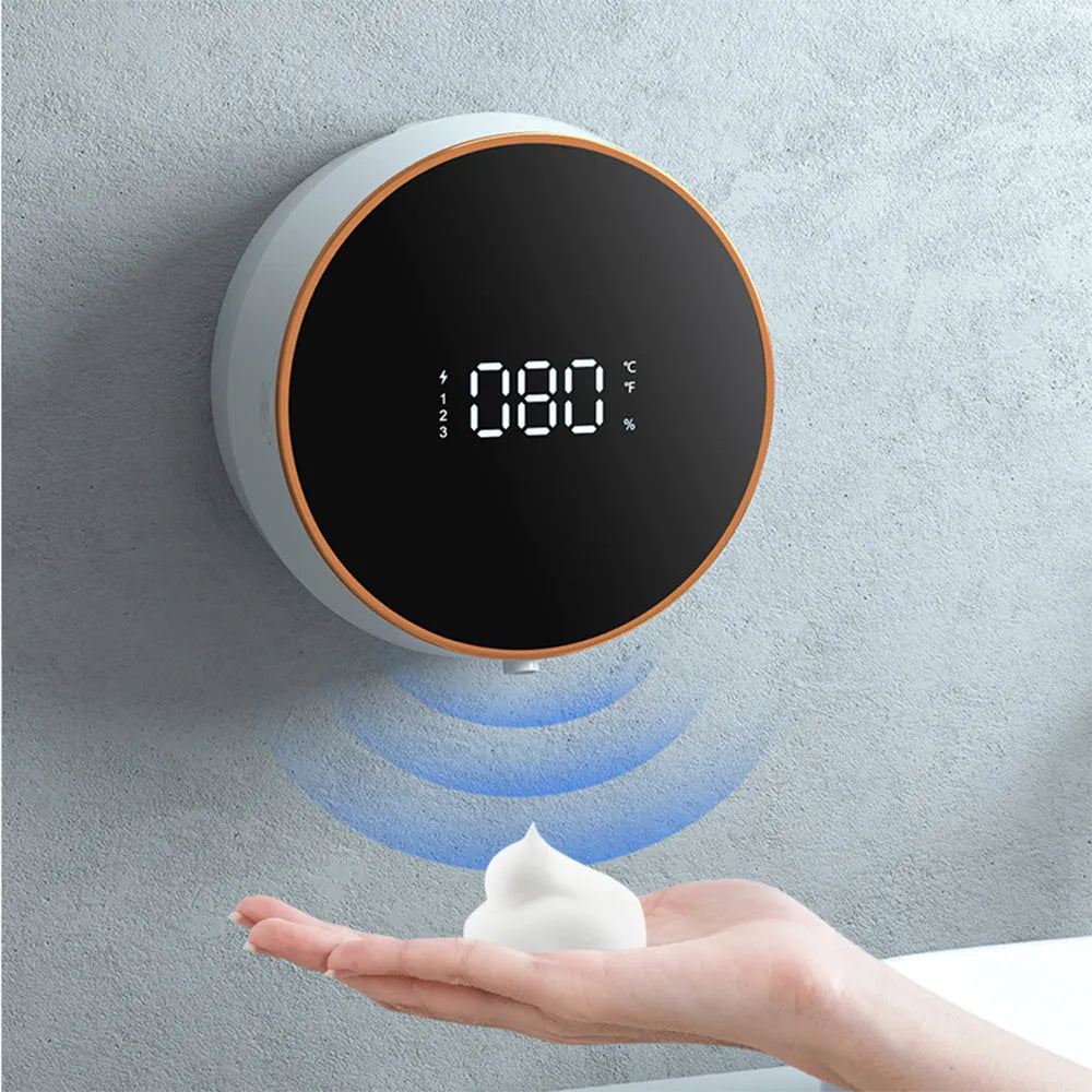 Black and white automatic wall-mounted foam soap dispenser with sensor and USB charging port.