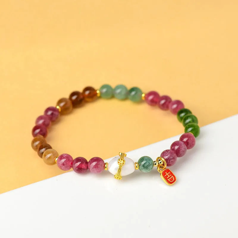 Geometric natural chalcedony bracelet for men and women with 6.5mm beads in optimised tourmaline colour.