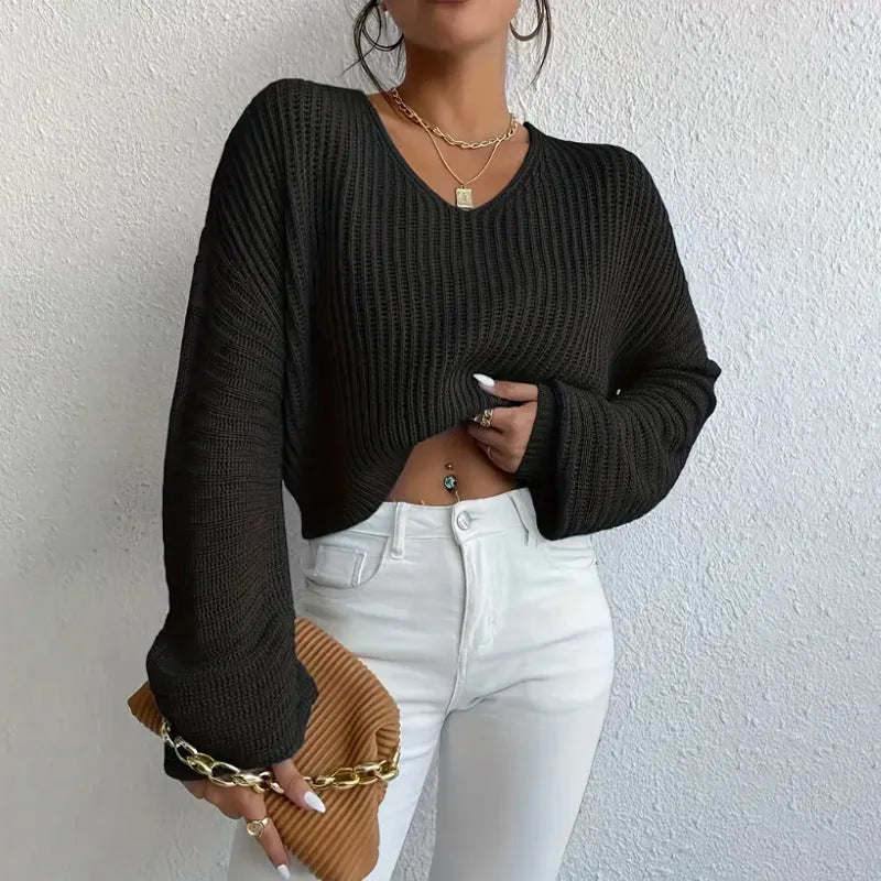 Women's solid colour long sleeve pullover top in a casual loose fit.