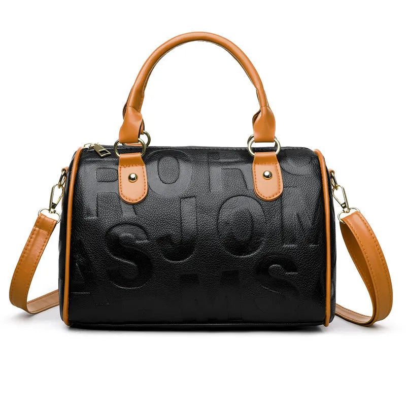Brown cylindrical PU crossbody bag with three adjustable shoulder straps on a plain background.