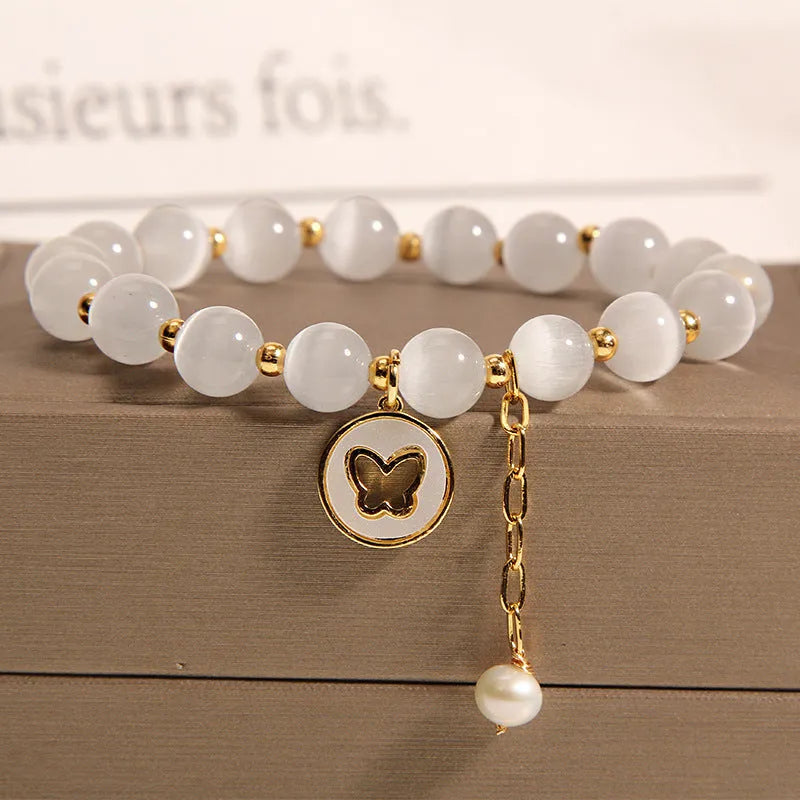 White crystal bracelet with geometric design and cat's eye stones in Korean style