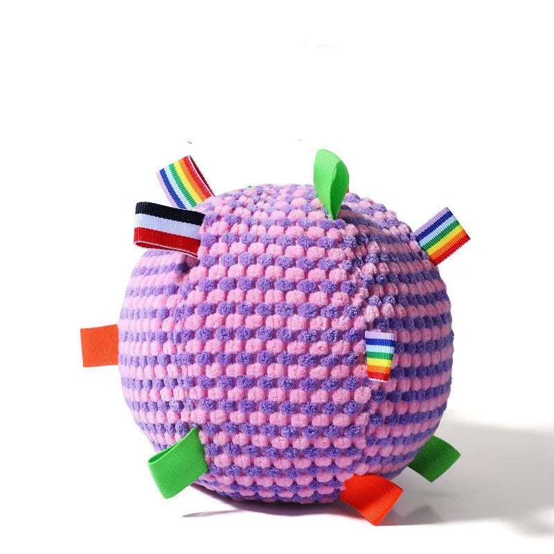 Blue and yellow pineapple lattice dog ball with holes and a vocal ring inside, 17cm diameter.