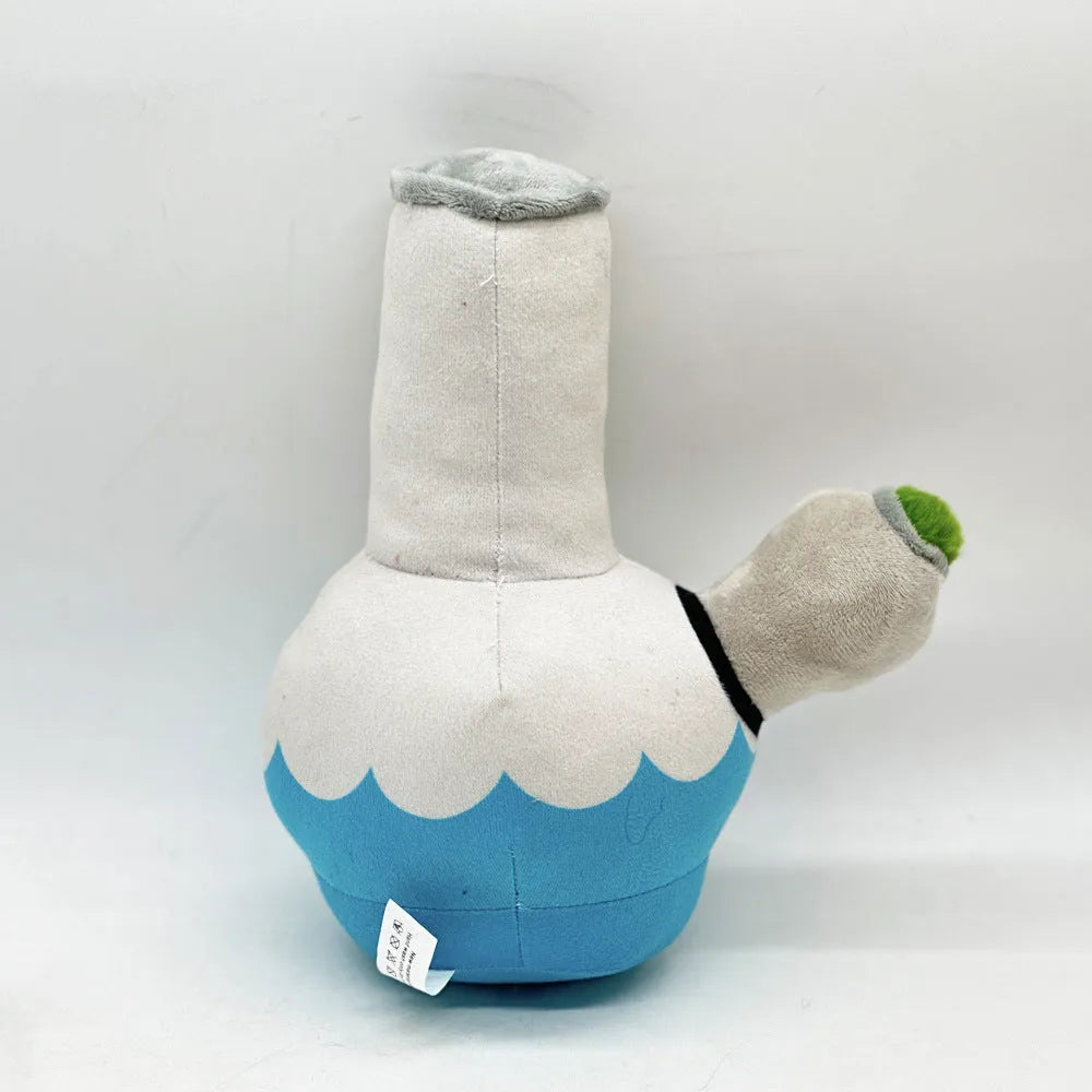 Kettle-shaped dog plush toy with colourful printed patterns, measuring 24cm