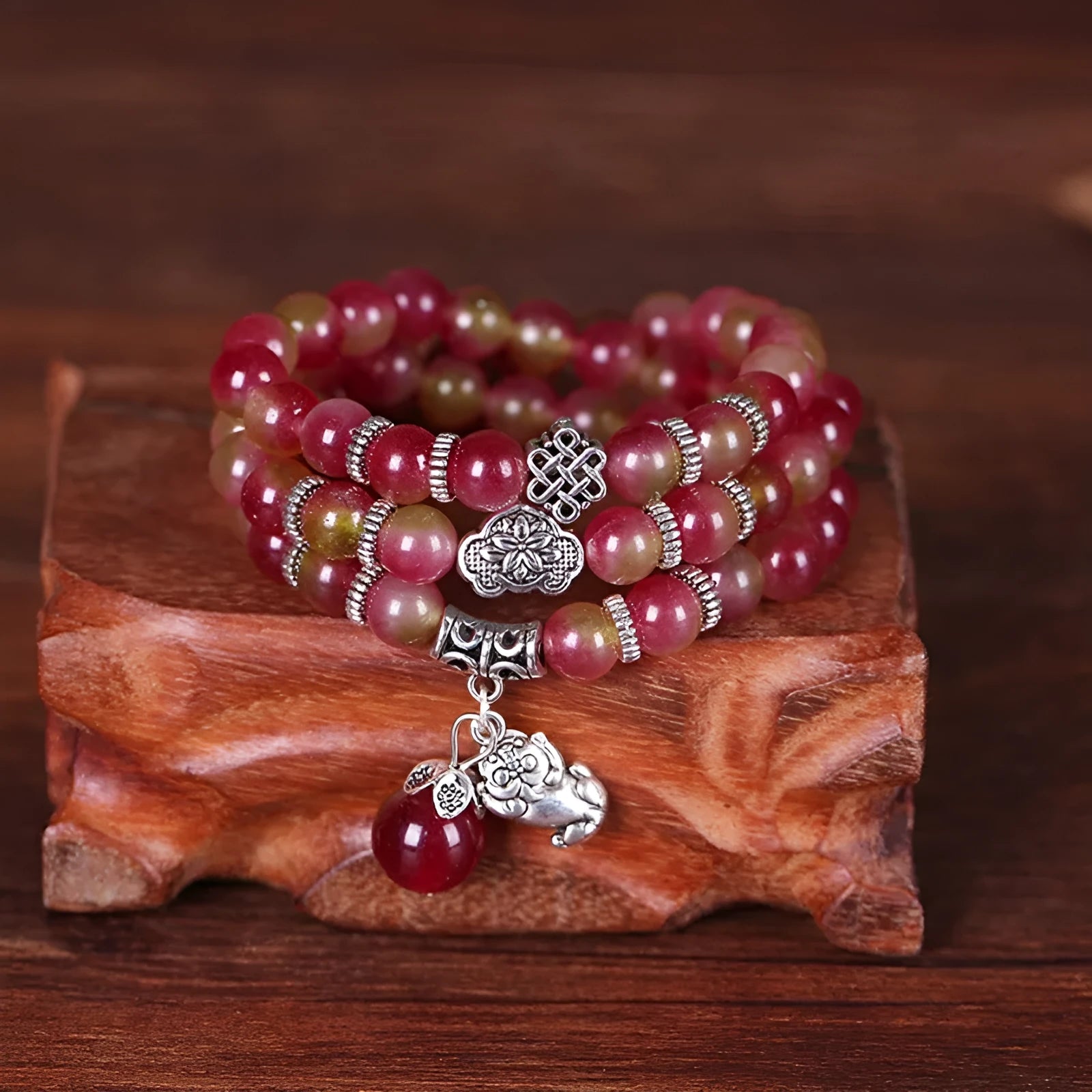Handmade natural watermelon crystal bracelet with Chinese knot closure in national style.