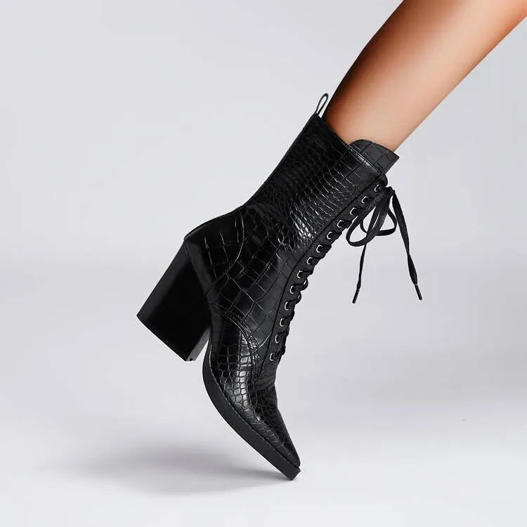 Dark brown retro pointed toe ankle boots with lace detailing and a chunky heel on a white background.